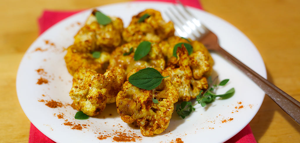Rezeptbild zu überbackener Curry Blumenkohl mit Käse als Abnehmrezept und zum Fettabbau